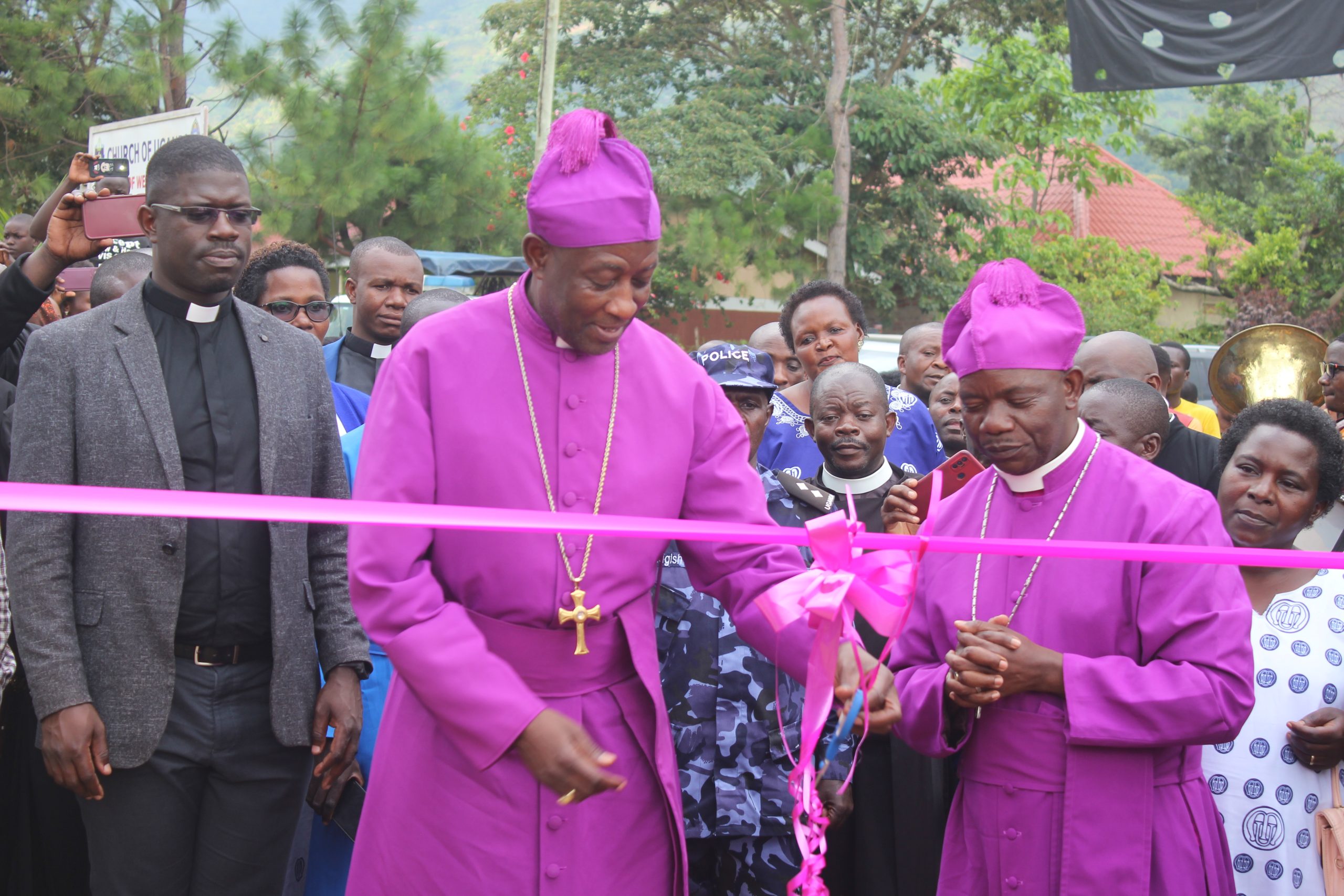 Cutting Ribons by the Archbishop on the Alpha and Omega Diocese Lodge